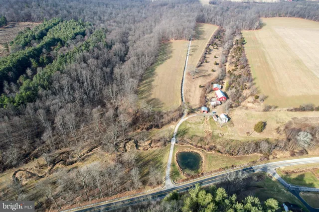 a view of an ocean beach and mountain