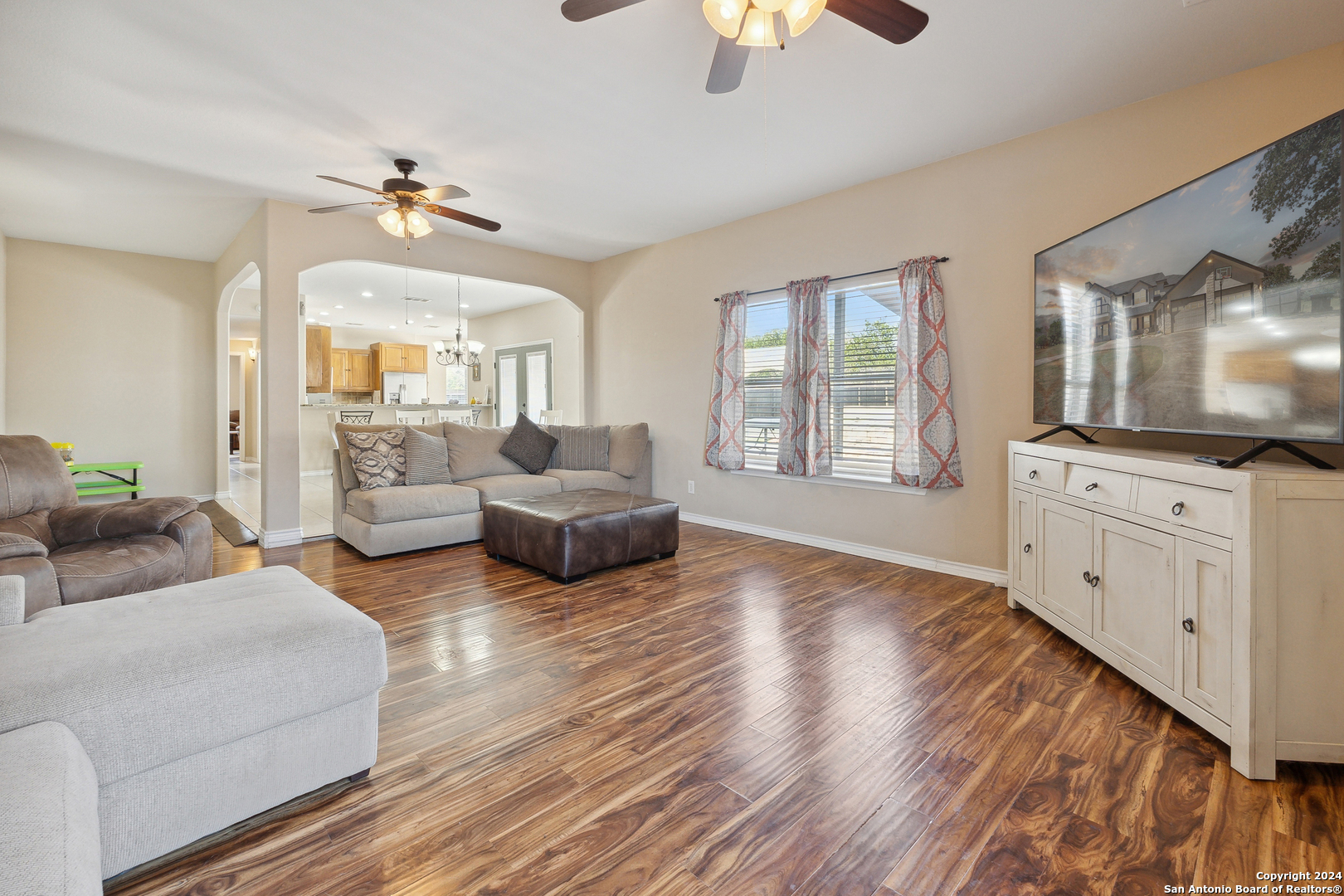 166 Desert Poppy Drive Bandera, TX 78003 - Photo 13 of 50 a living room with furniture and a flat screen tv
