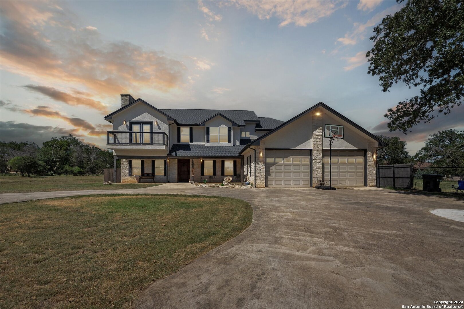 166 Desert Poppy Drive Bandera, TX 78003 - Photo 4 of 50 front view of a house with a yard