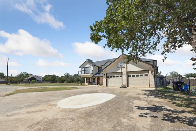 a house with trees in the background