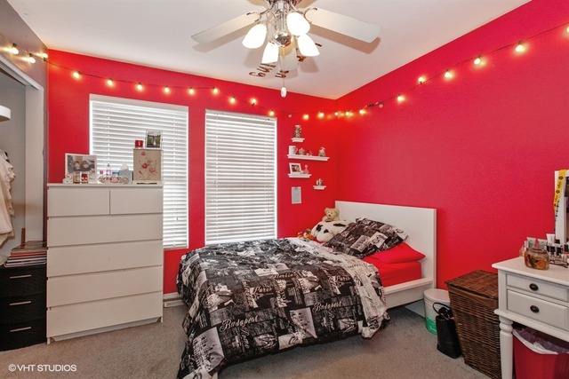 534 Wynbrooke Road Romeoville, IL 60446 - Photo 11 of 15 a bedroom with a bed and a ceiling fan