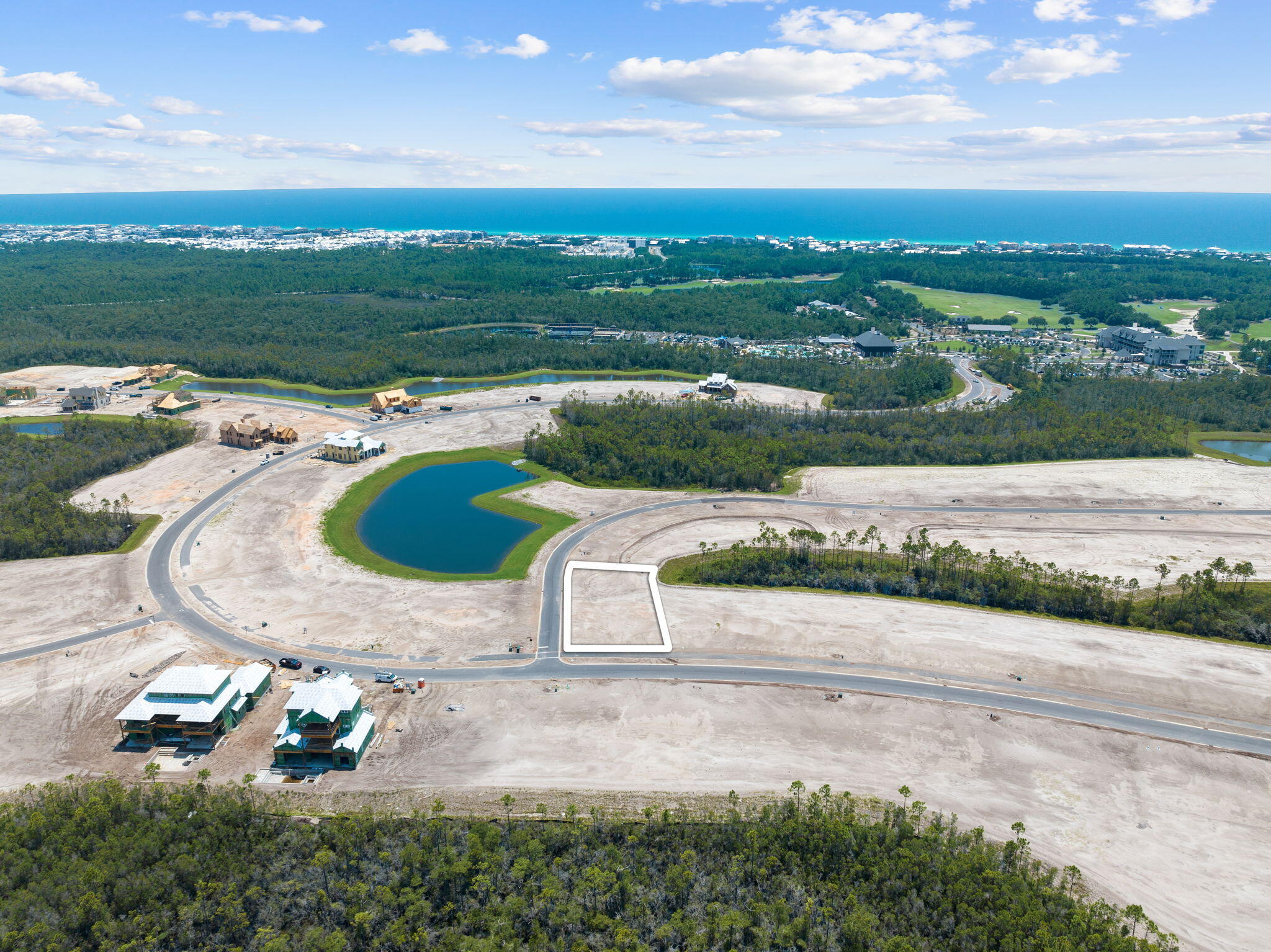 Lot 69 Sancord Dr Inlet Beach Inlet Beach, FL 32461 - Photo 6 of 14 an aerial view of a house with a yard and lake view