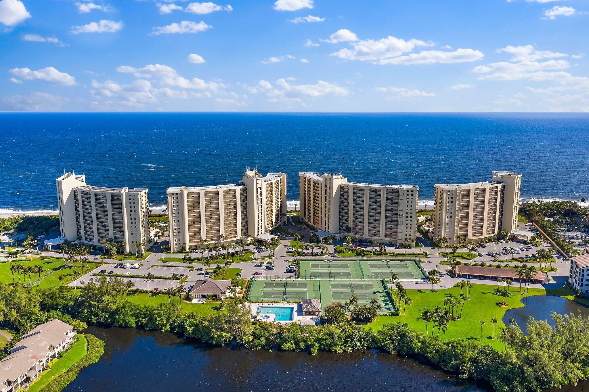 100 Ocean Trail Way, Unit 609 Jupiter, FL 33477 - Photo 45 of 66 a view of a city with tall buildings