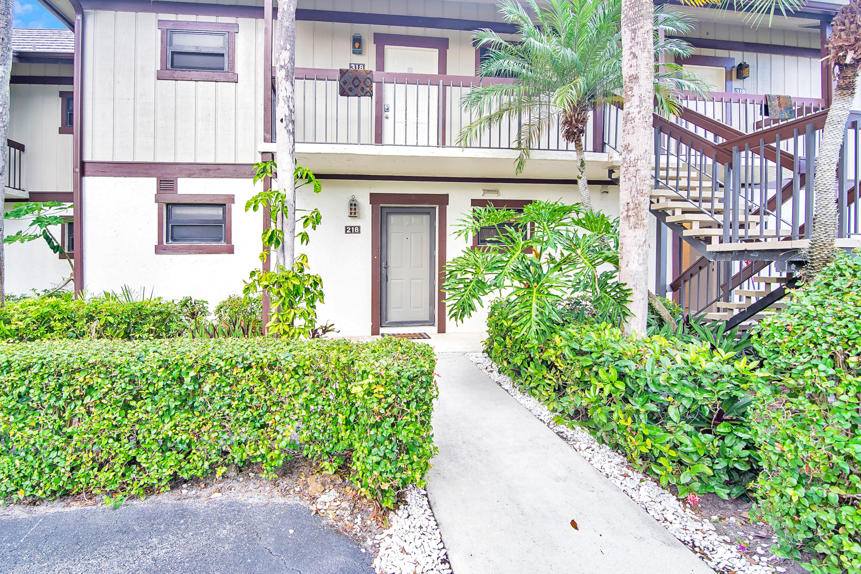13334 Polo Club Road, Unit 218 Wellington, FL 33414 - Photo 1 of 13 front view of a house
