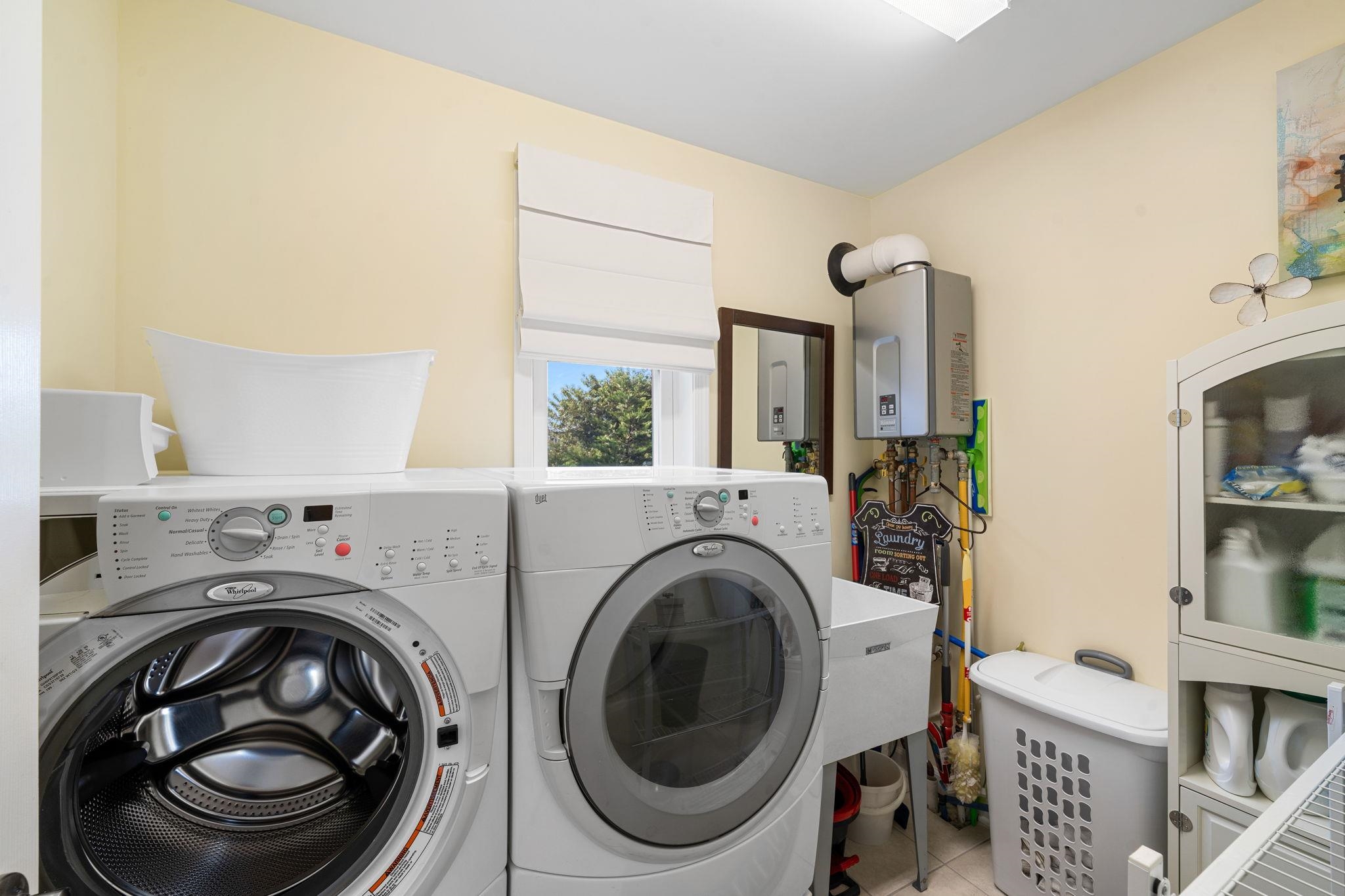 704 South Commonwealth Avenue Strathmere, NJ 08248 - Photo 13 of 50 a utility room with dryer and washer