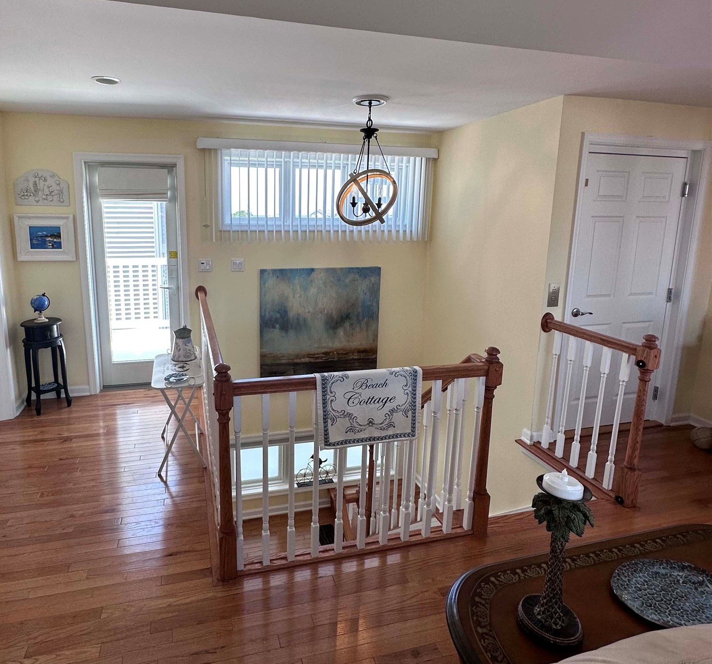 704 South Commonwealth Avenue Strathmere, NJ 08248 - Photo 22 of 50 a living room with furniture and a wooden floor