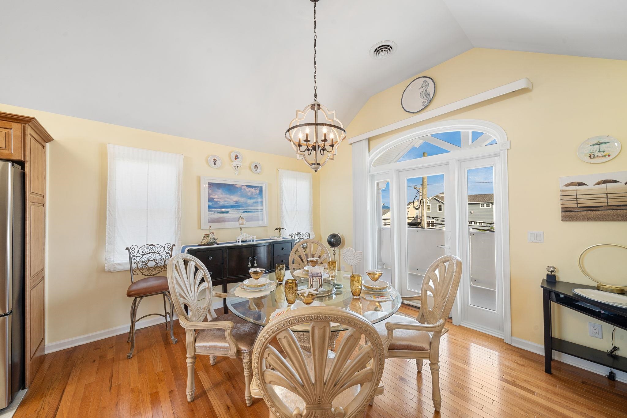 704 South Commonwealth Avenue Strathmere, NJ 08248 - Photo 28 of 50 a view of a dining room with furniture window and wooden floor