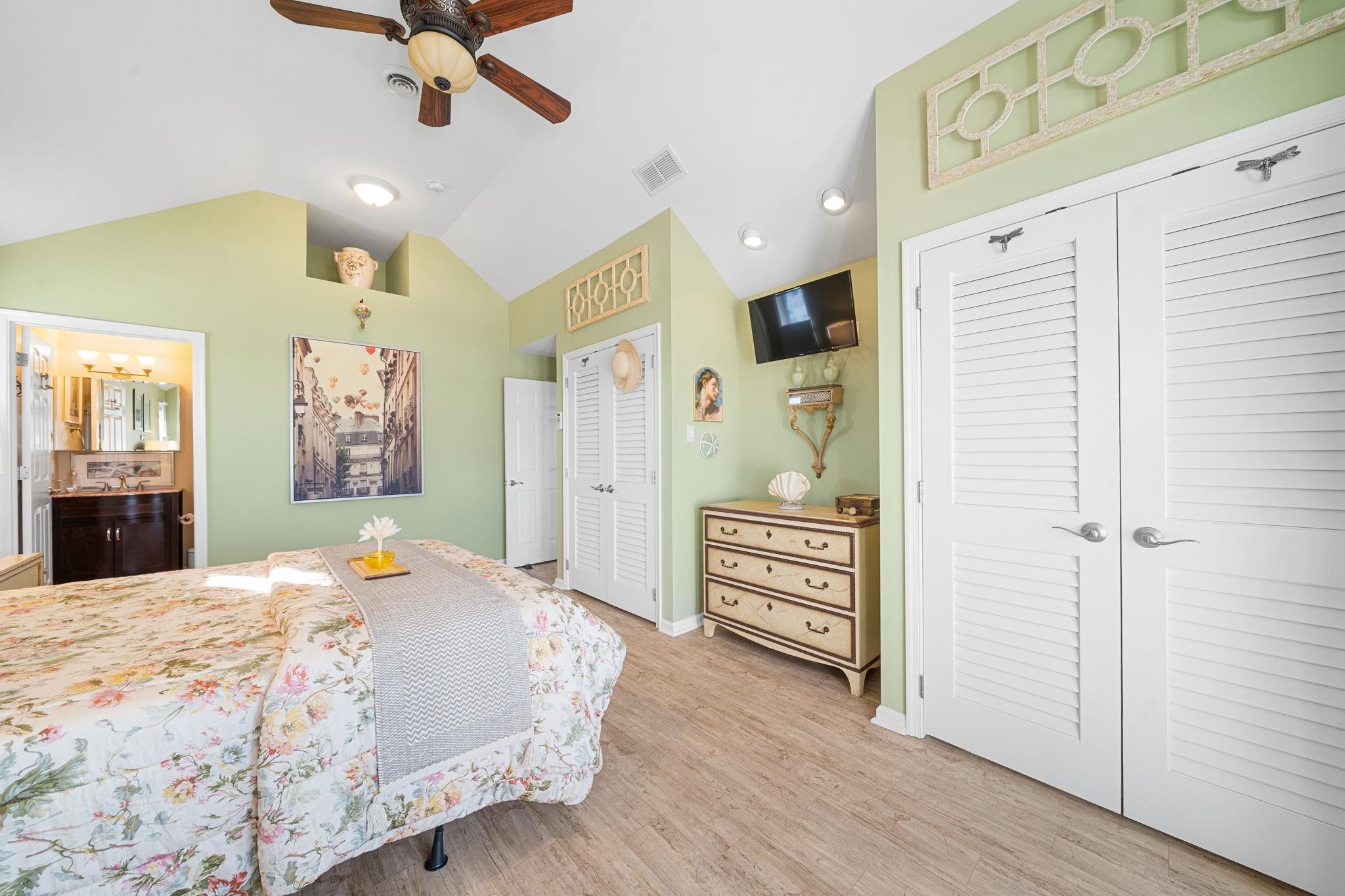 704 South Commonwealth Avenue Strathmere, NJ 08248 - Photo 42 of 50 a bedroom with a bed dresser and a window
