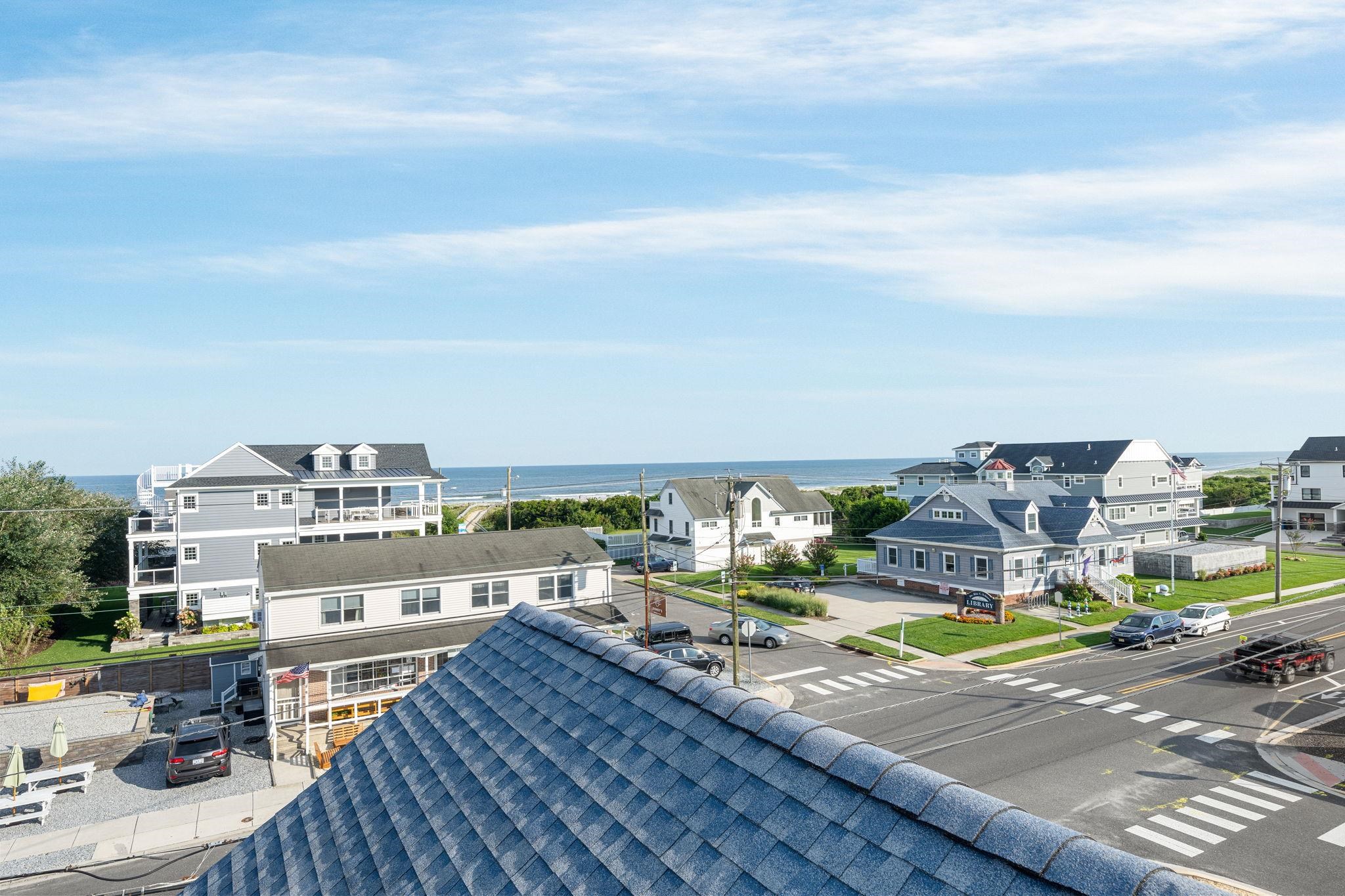 704 South Commonwealth Avenue Strathmere, NJ 08248 - Photo 44 of 50 a view of a swimming pool with an ocean view