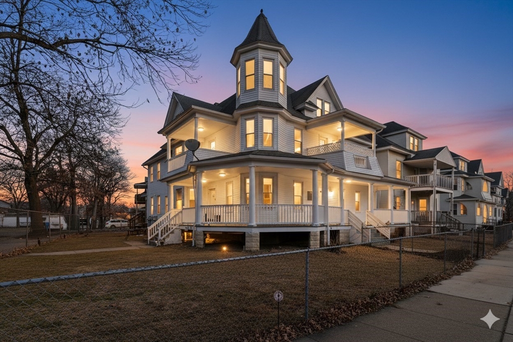 a view of a building with a yard