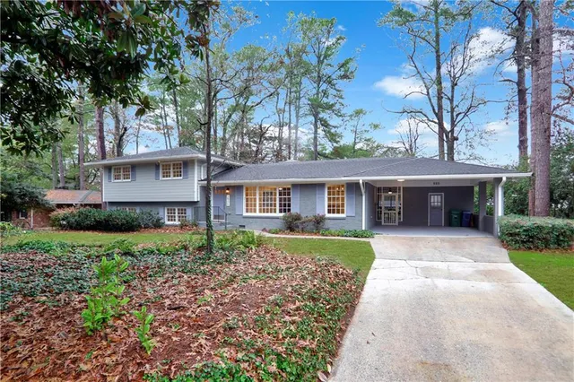 front view of a house with a yard
