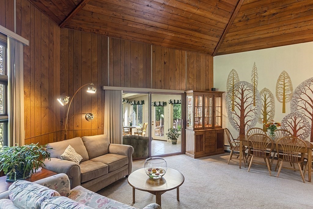 190 Davis Road Westminster, MA 01473 - Photo 13 of 41 a living room with furniture a rug and a wall painting