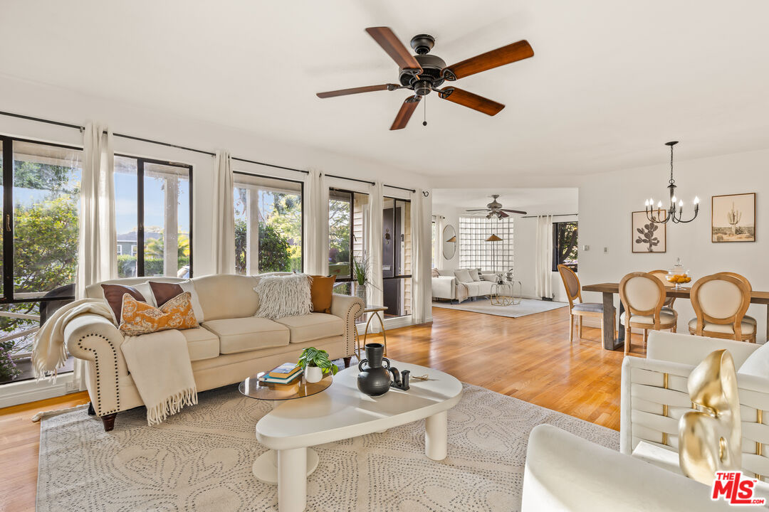 1100 Victoria Avenue Venice, CA 90291 - Photo 8 of 30 a living room with furniture and a large window