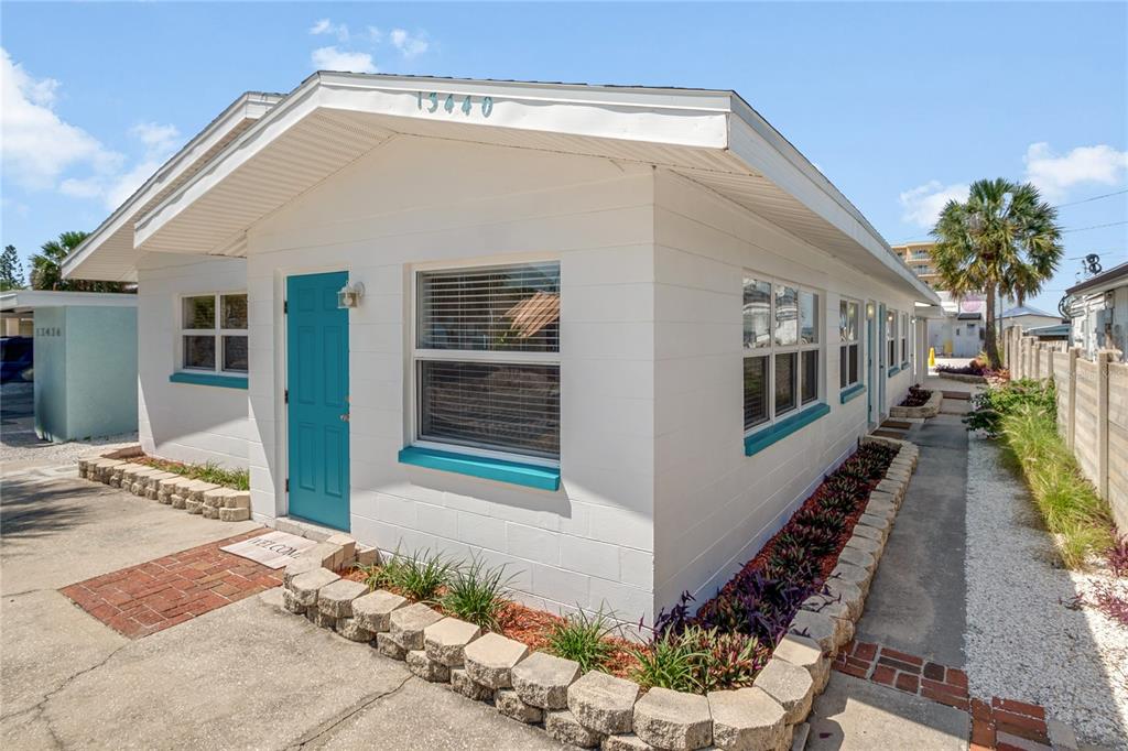 13440 1st Street East Madeira Beach, FL 33708 - Photo 6 of 44 a view of a house with a backyard