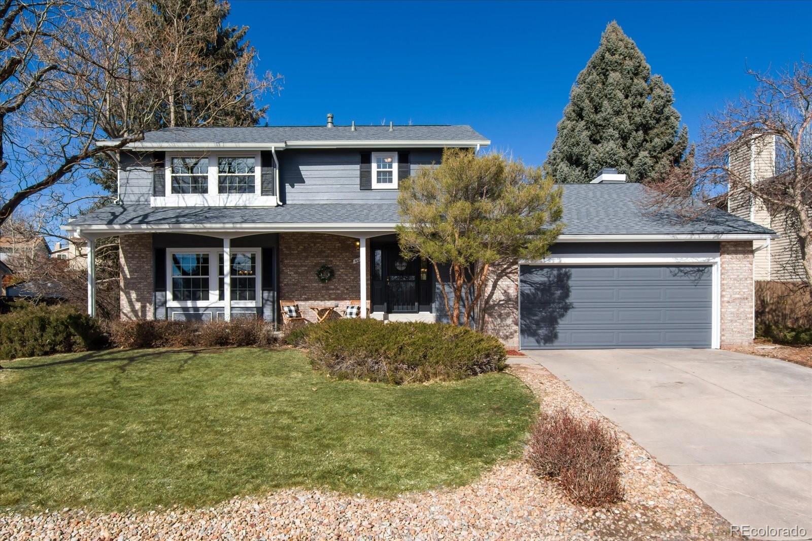 405 Northridge Road Highlands Ranch, CO 80126 - Photo 1 of 40 front view of a house with a yard