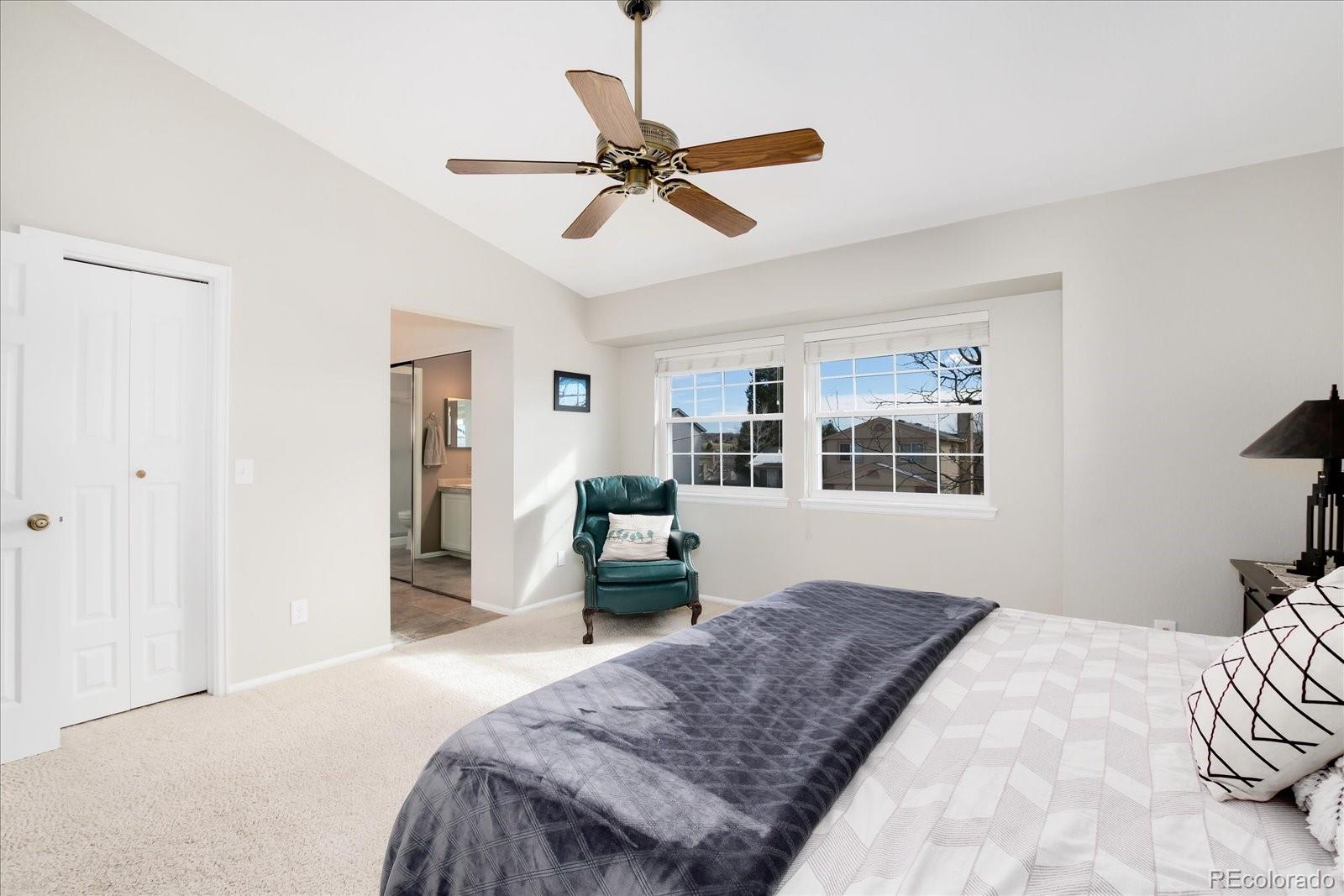 405 Northridge Road Highlands Ranch, CO 80126 - Photo 19 of 40 a bedroom with a bed and window
