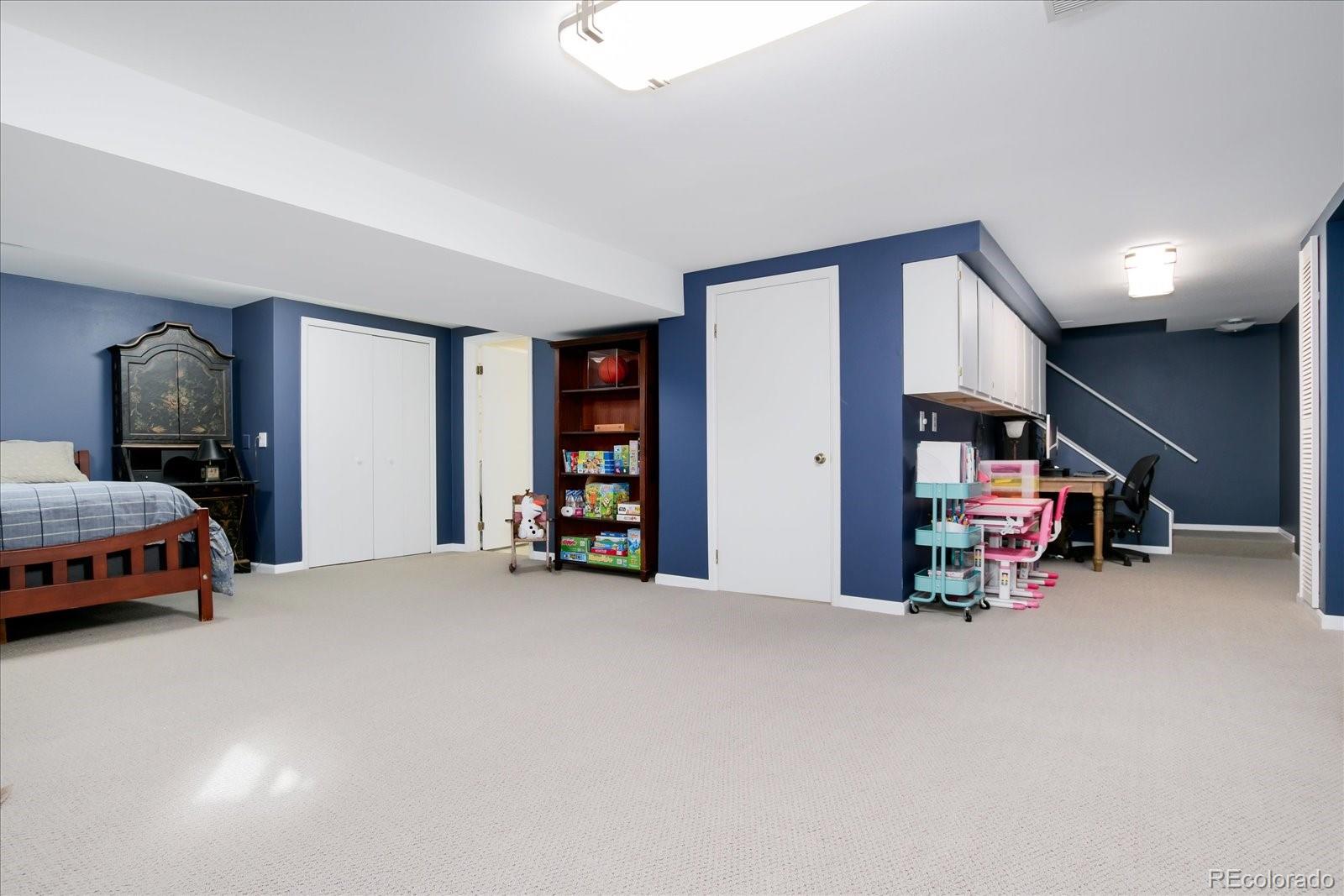 405 Northridge Road Highlands Ranch, CO 80126 - Photo 26 of 40 a car is parked in a room