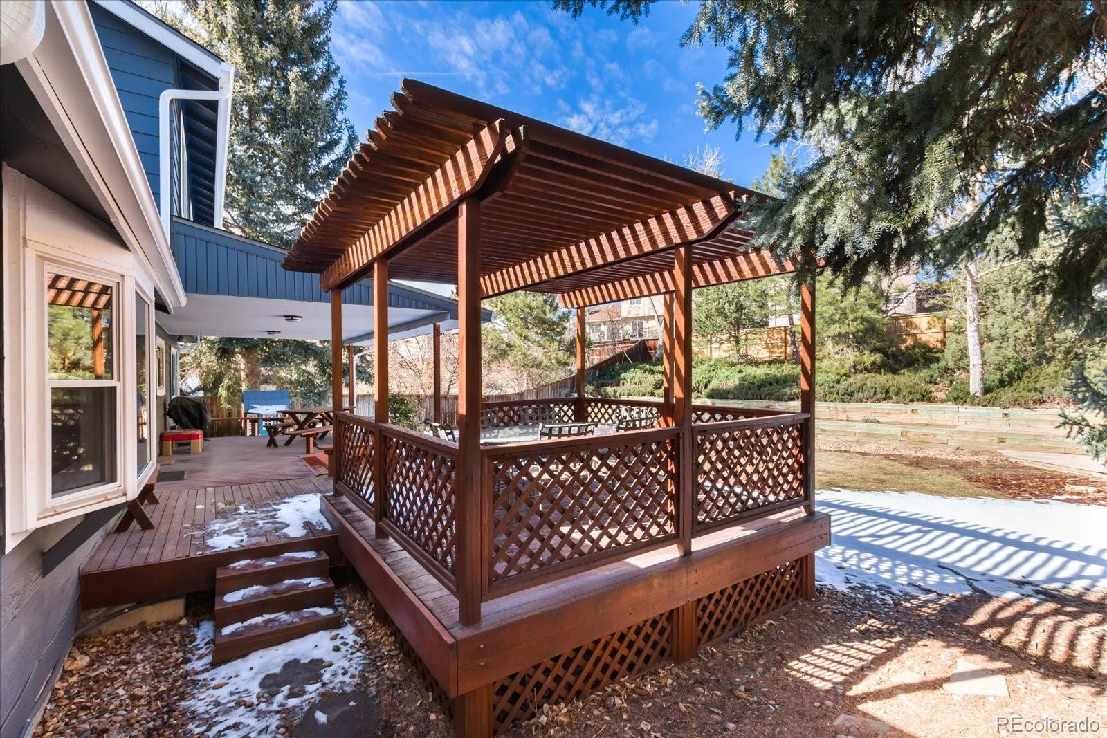 405 Northridge Road Highlands Ranch, CO 80126 - Photo 34 of 40 a view of a patio with iron fence