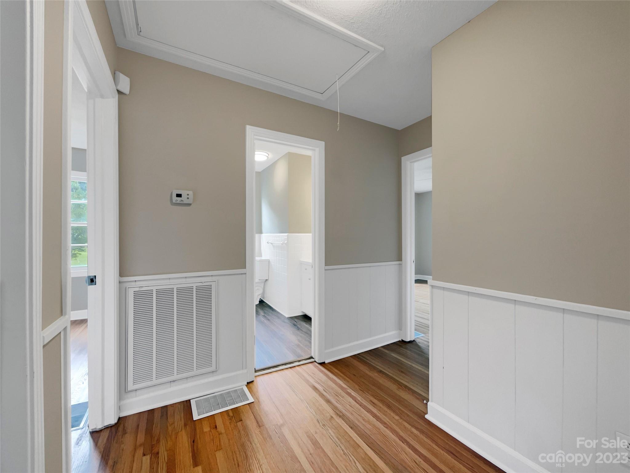 4719 Pleasant Grove Road Waxhaw, NC 28173 - Photo 14 of 24 a view of hallway with wooden floor
