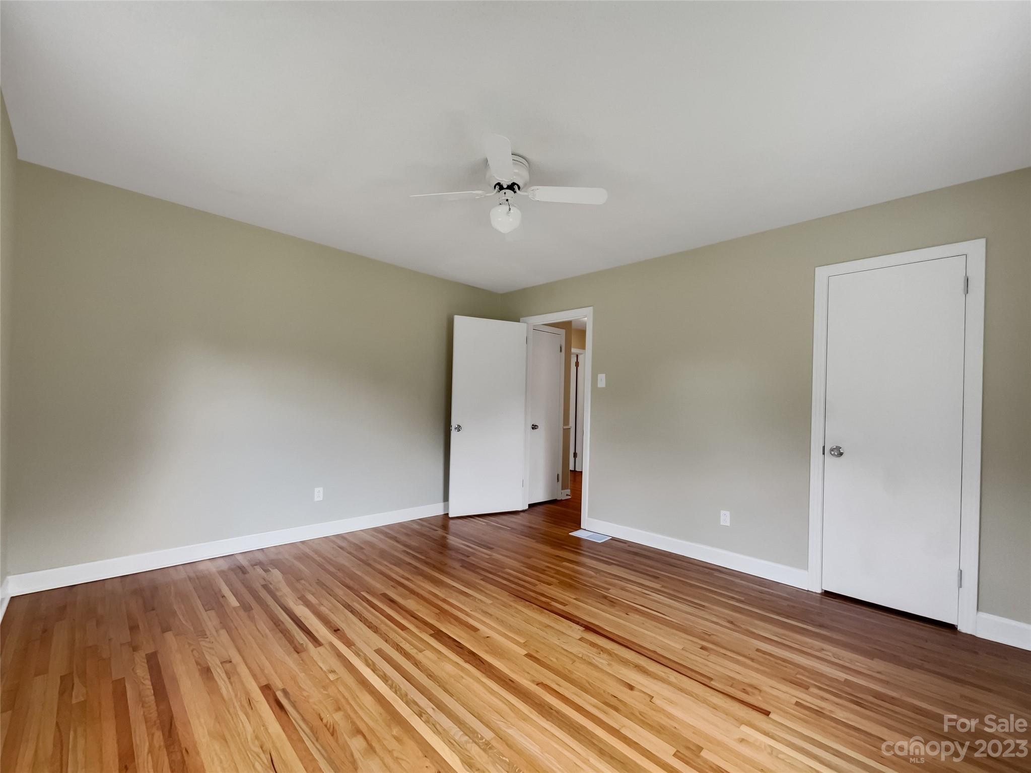 4719 Pleasant Grove Road Waxhaw, NC 28173 - Photo 16 of 24 wooden floor in an empty room