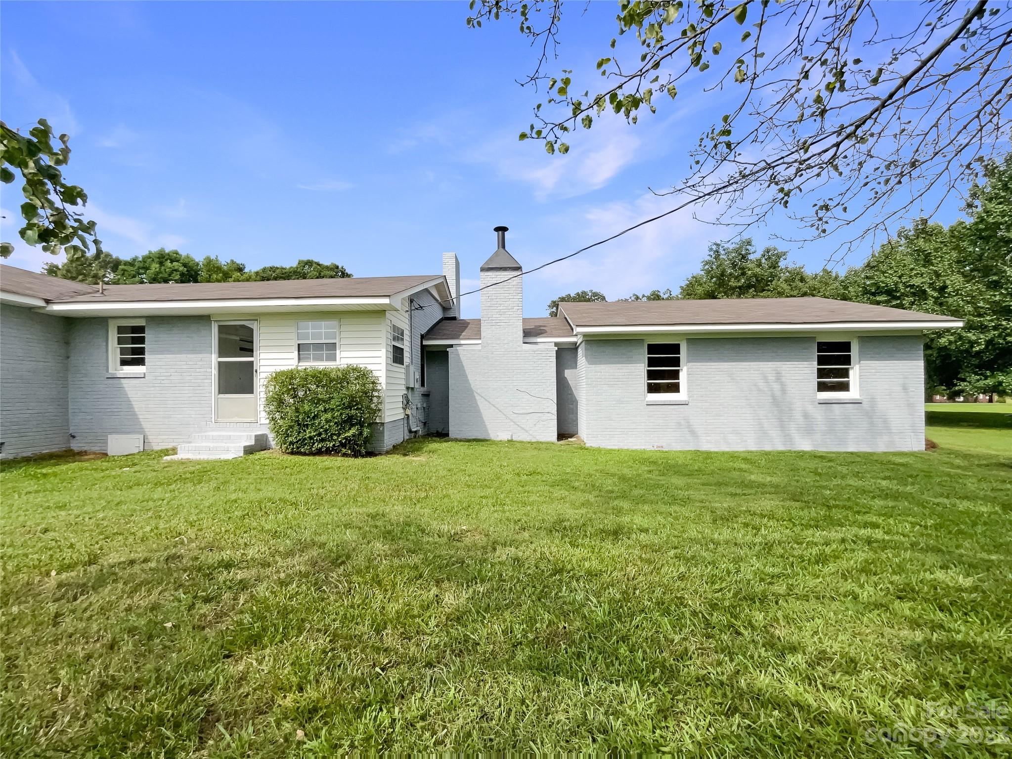 4719 Pleasant Grove Road Waxhaw, NC 28173 - Photo 24 of 24 a front view of house with yard and trees