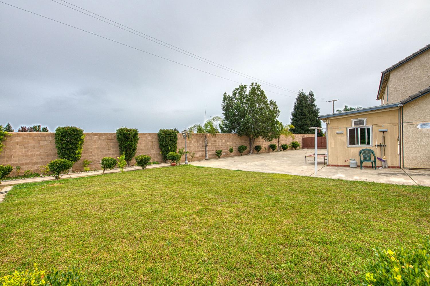 1002 Sequoia Court Fowler, CA 93625 - Photo 23 of 54 a swimming pool view with a outdoor seating space