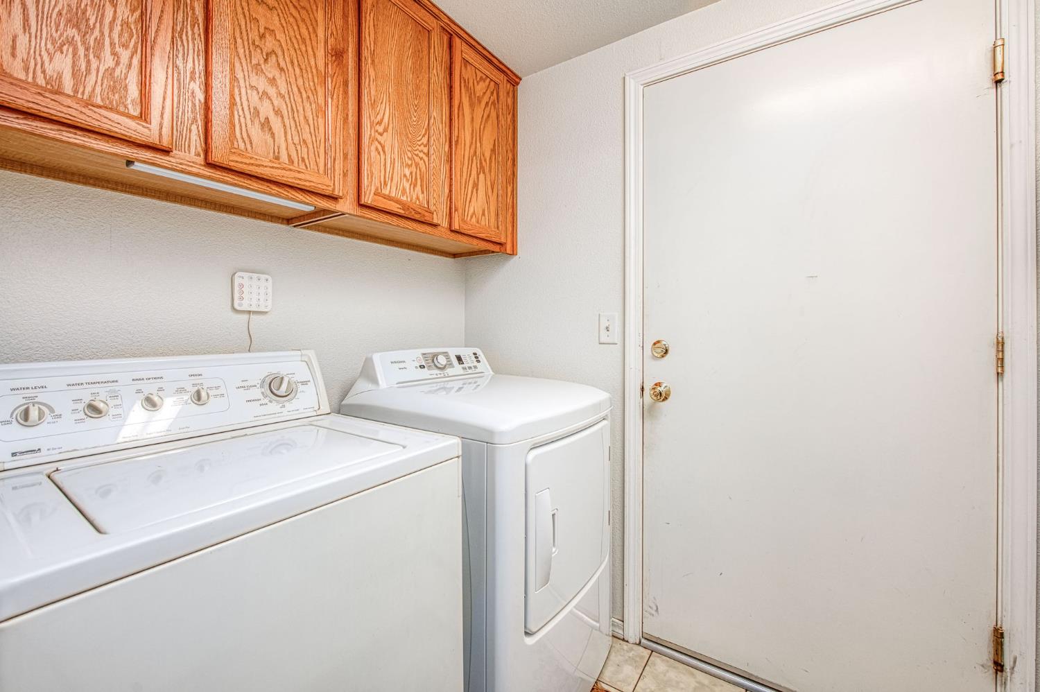 1002 Sequoia Court Fowler, CA 93625 - Photo 39 of 54 a utility room with dryer and washer