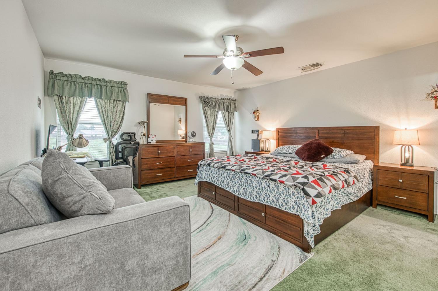 1002 Sequoia Court Fowler, CA 93625 - Photo 51 of 54 a bedroom with a large bed and a window