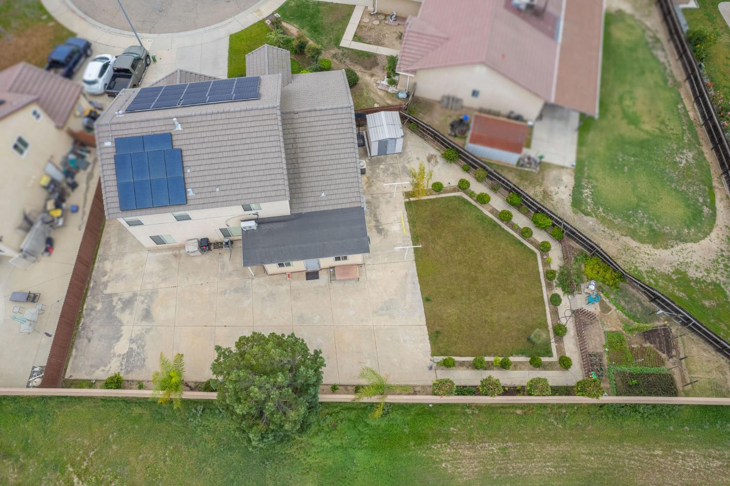 1002 Sequoia Court Fowler, CA 93625 - Photo 7 of 54 an aerial view of a house with a yard