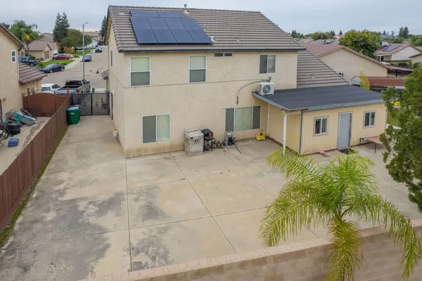 a view of a house with a patio