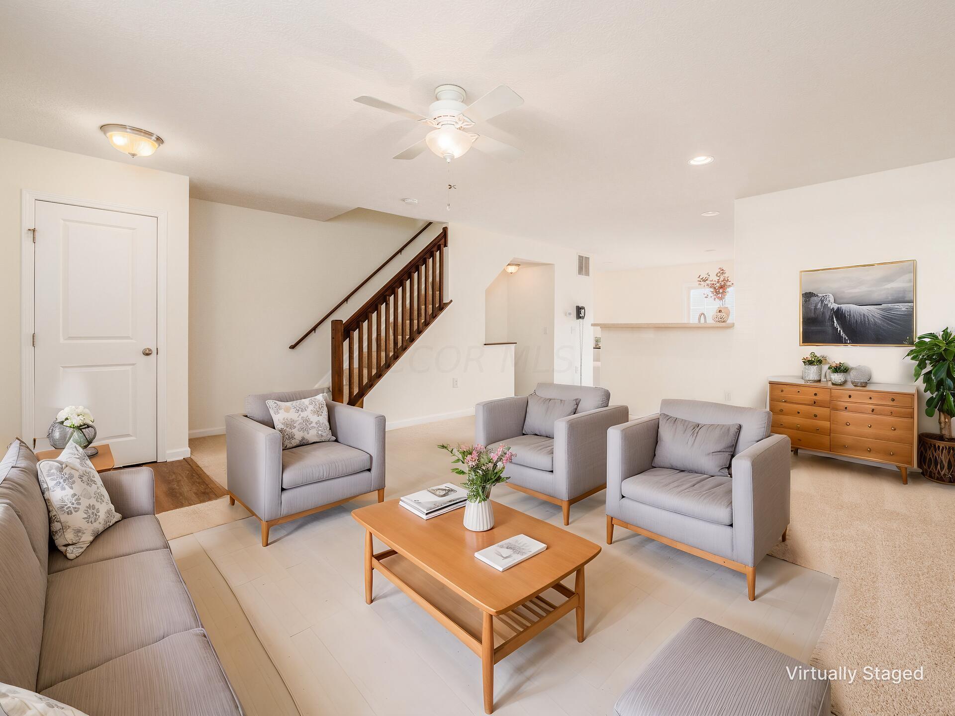 6305 Needletail Road, Unit 25 Columbus, OH 43230 - Photo 11 of 49 Living room open to kitchen.