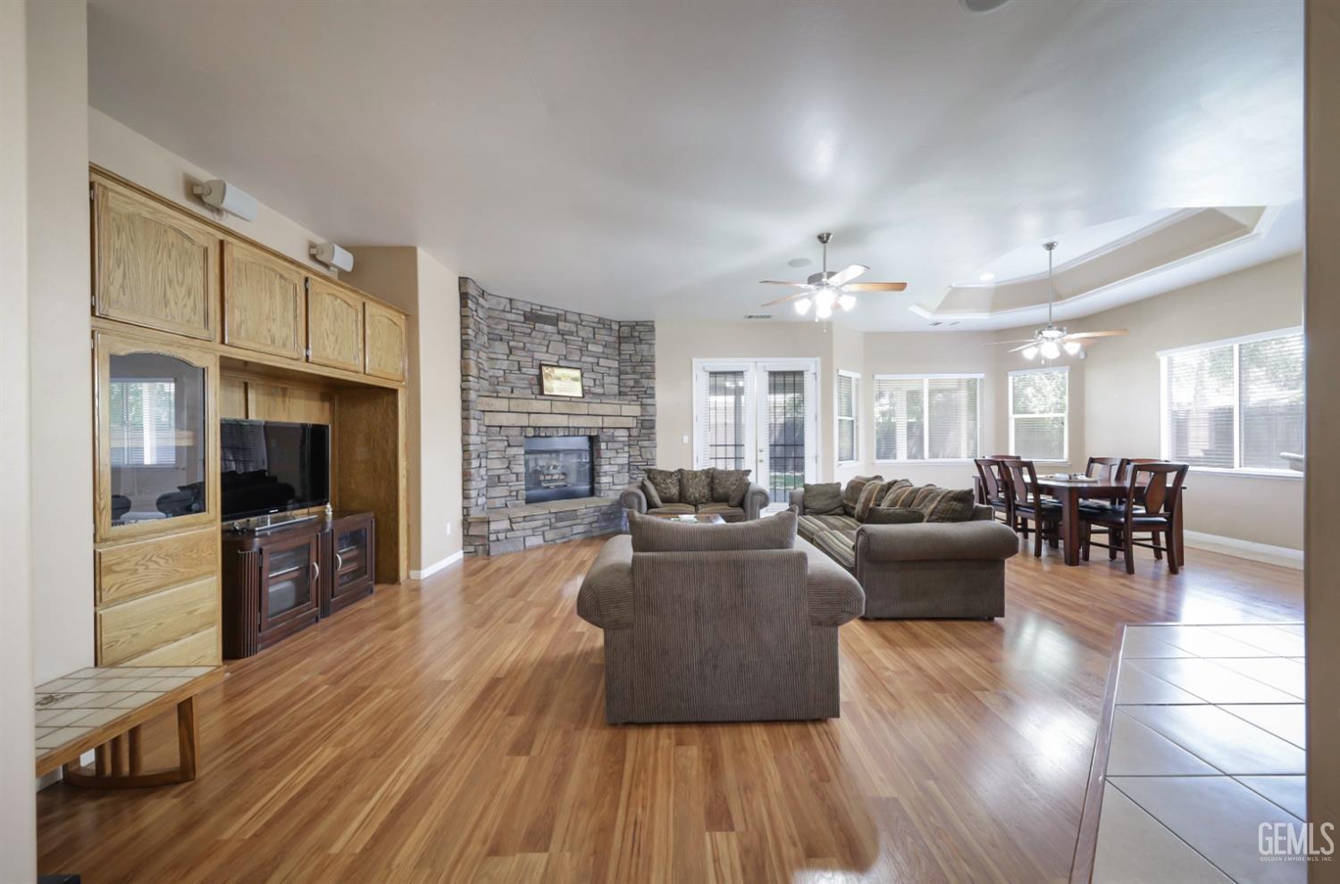 Undisclosed Address Bakersfield, CA 93313 - Photo 16 of 29 a living room with furniture fireplace and flat screen tv