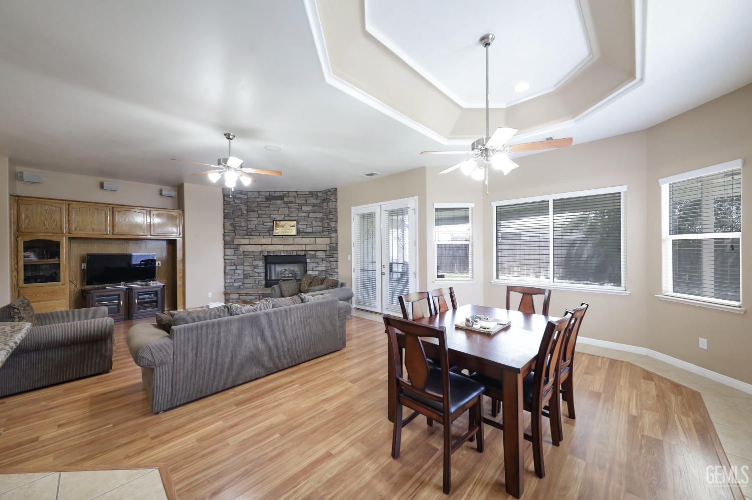 Undisclosed Address Bakersfield, CA 93313 - Photo 22 of 29 a view of a dining room with furniture window and wooden floor