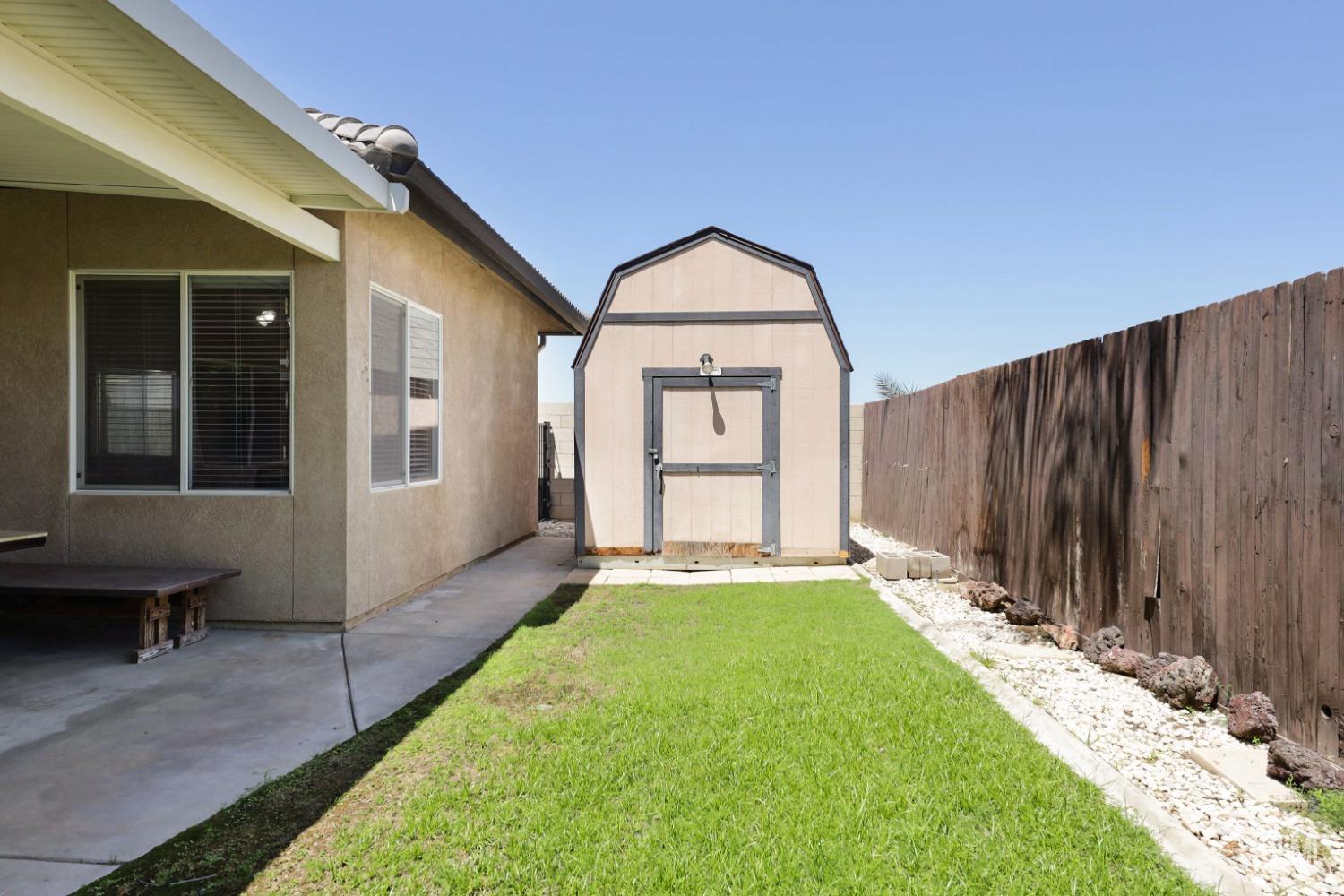 Undisclosed Address Bakersfield, CA 93313 - Photo 25 of 29 a view of an entrance to house with yard