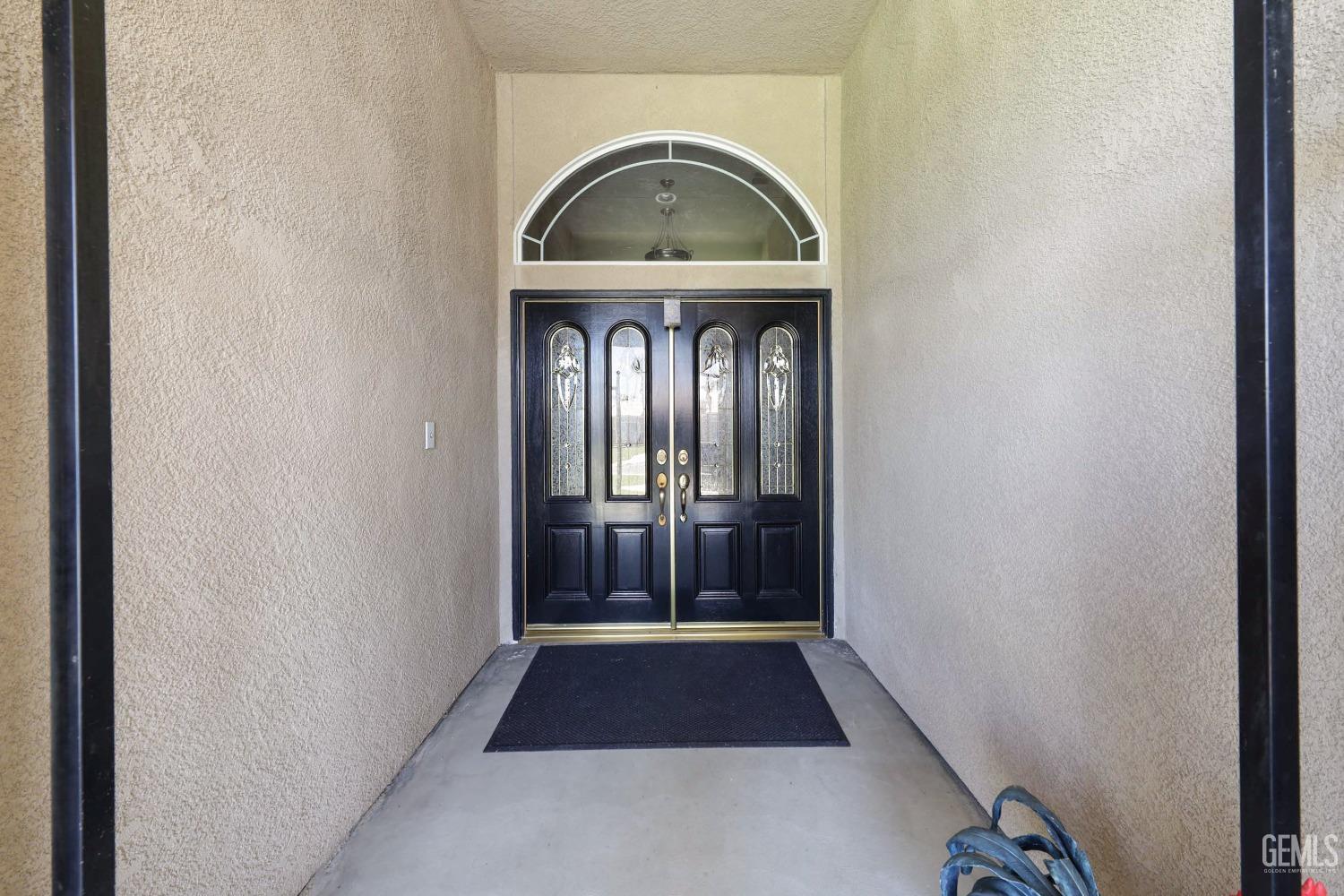 Undisclosed Address Bakersfield, CA 93313 - Photo 4 of 29 a view of entryway with wooden floor