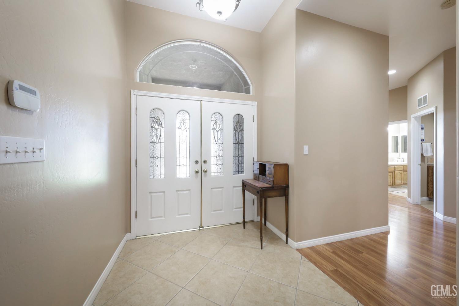 Undisclosed Address Bakersfield, CA 93313 - Photo 5 of 29 a view of livingroom with furniture and wooden floor
