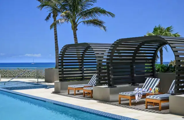 a lobby with furniture and a chair