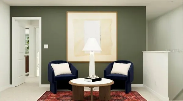 a living room with furniture and a lamp