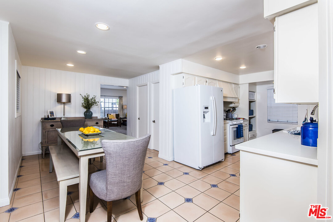 27 30th Avenue Venice, CA 90291 - Photo 16 of 49 a view of a dining room with furniture and a refrigerator