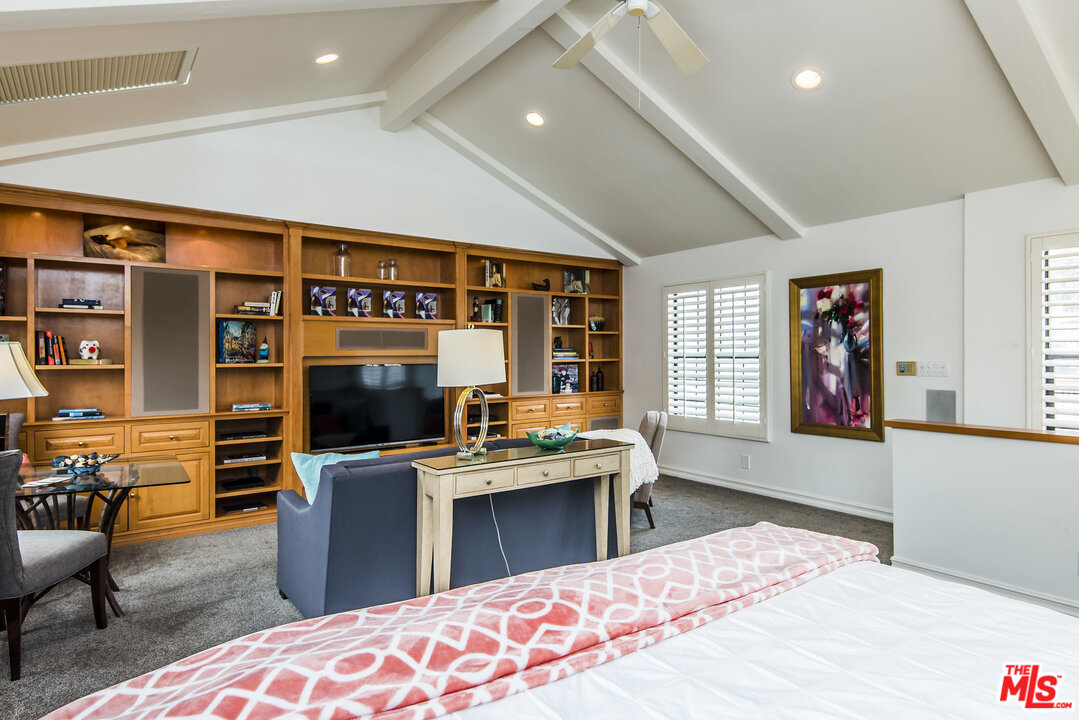 27 30th Avenue Venice, CA 90291 - Photo 37 of 49 a open kitchen with stainless steel appliances granite countertop a stove and a view of living room