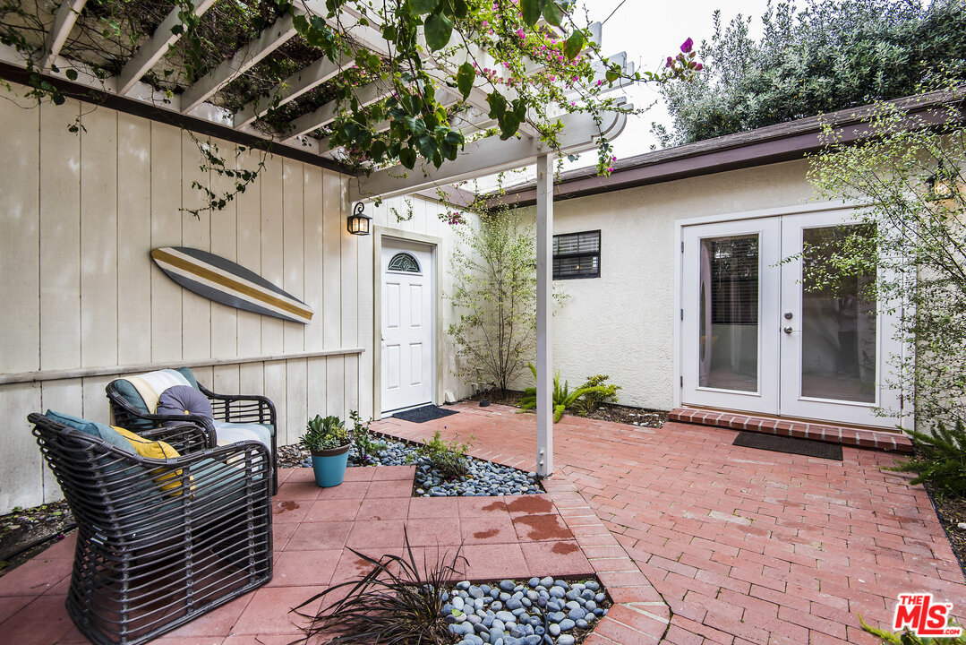 27 30th Avenue Venice, CA 90291 - Photo 42 of 49 a view of a chair and table in backyard of the house