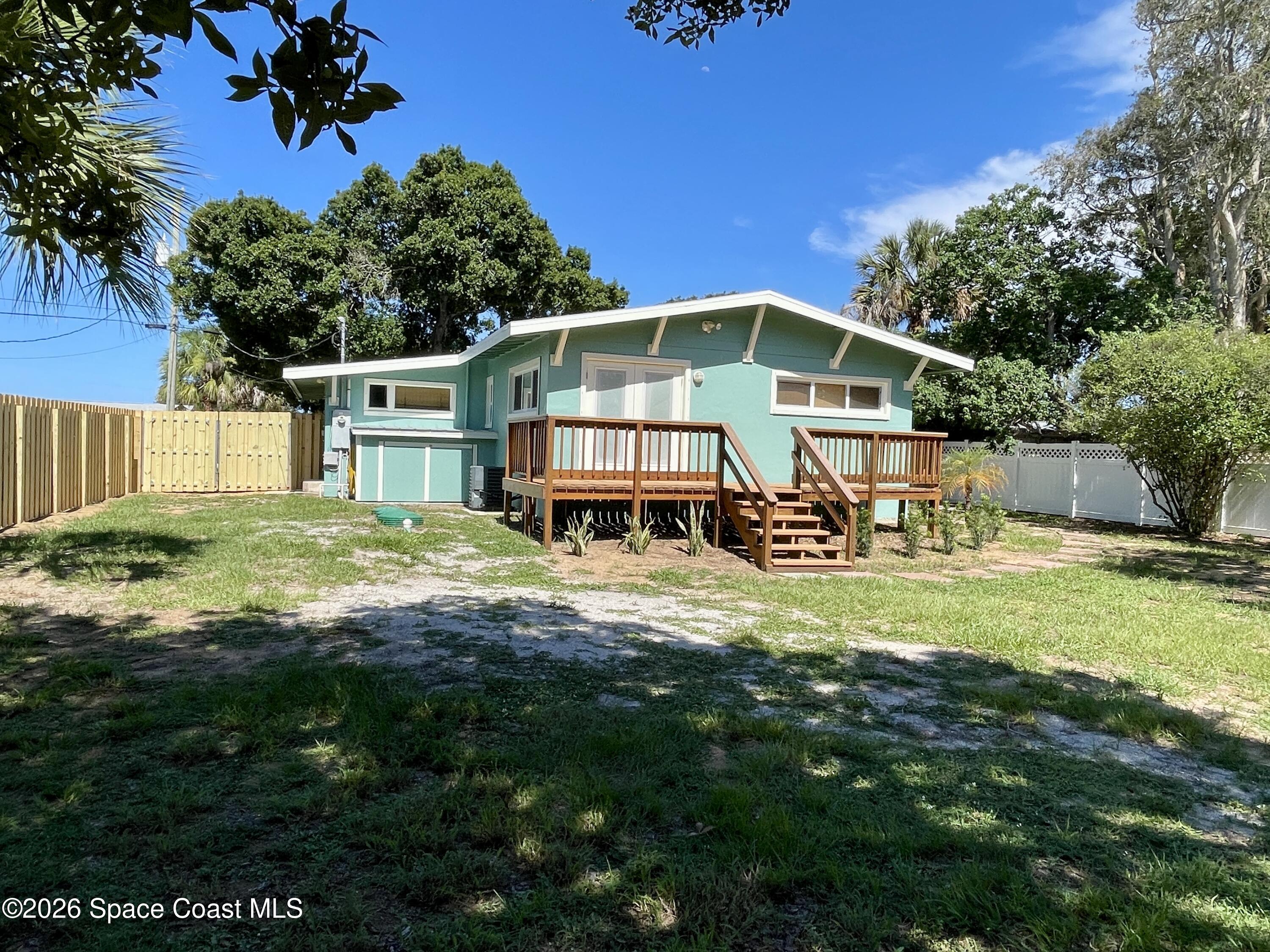 7260 Blue Shore Road Grant, FL 32949 - Photo 19 of 23 Back porch & yard