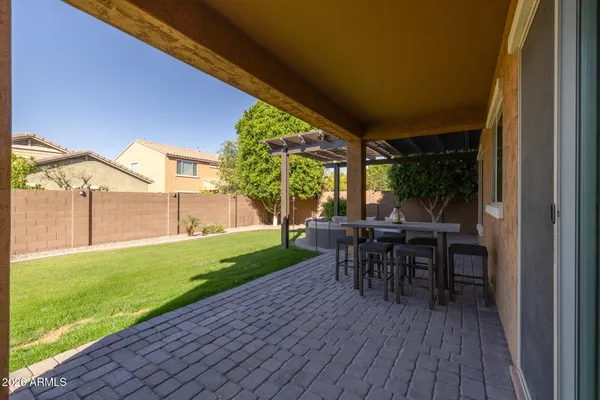 a view of a backyard with potted plants