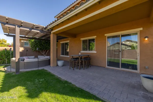 a view of a chairs and table on the terrace