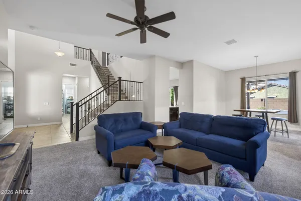 a view of a livingroom with furniture and window