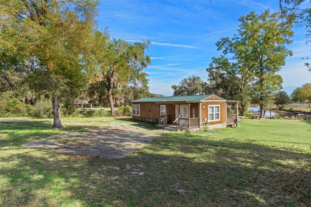 6287 North Crew Terrace Hernando, FL 34442 - Photo 13 of 38 a view of a house with a yard