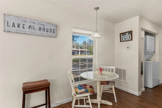 a bedroom with a bed window and a ceiling fan