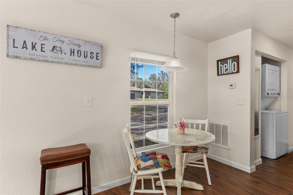 6287 North Crew Terrace Hernando, FL 34442 - Photo 20 of 38 a table and chairs in a room