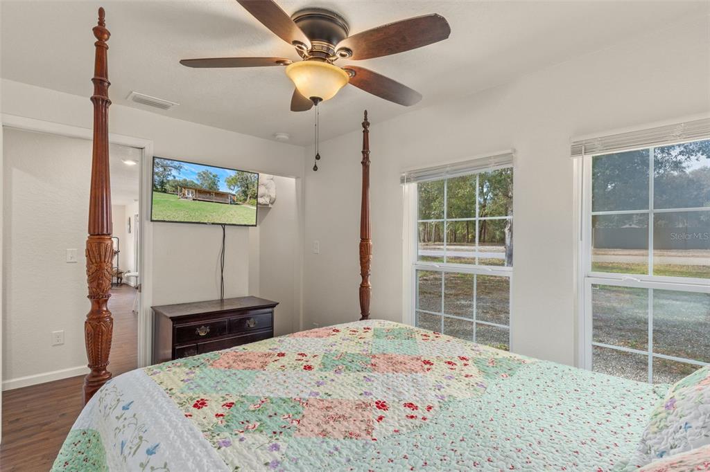 6287 North Crew Terrace Hernando, FL 34442 - Photo 24 of 38 a bedroom with a bed and a window