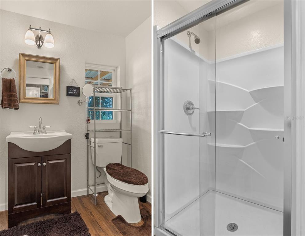 6287 North Crew Terrace Hernando, FL 34442 - Photo 27 of 38 a bathroom with a toilet a sink and shower